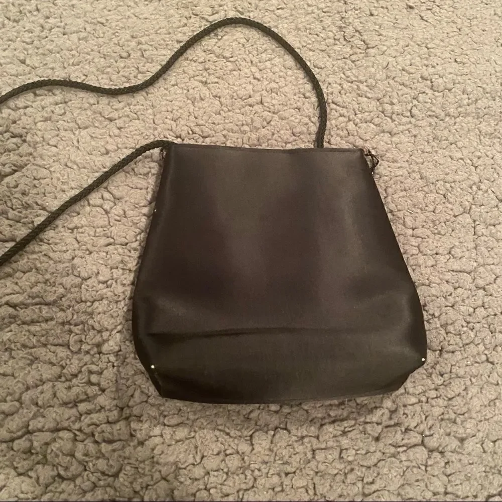 Black Elegant Bag With A Little Beading Hanging In Front
